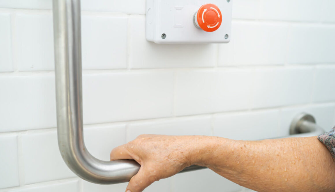 Asian senior or elderly old lady woman patient use toilet bathro
